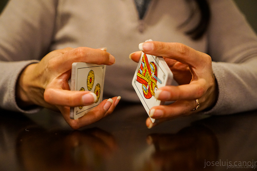 hands shuffling cards